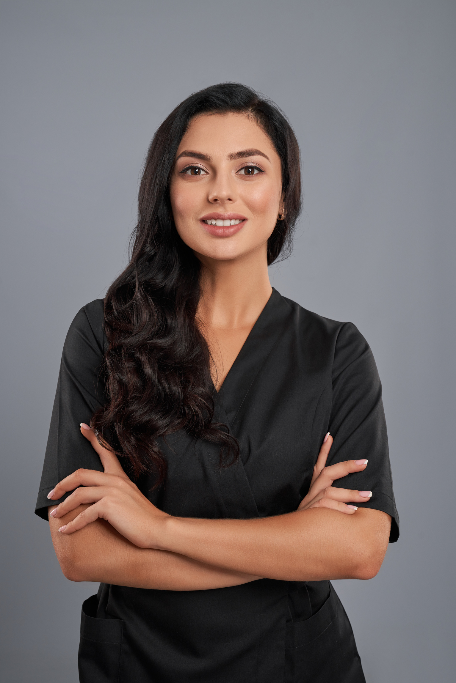 Female Beautician in Black Uniform